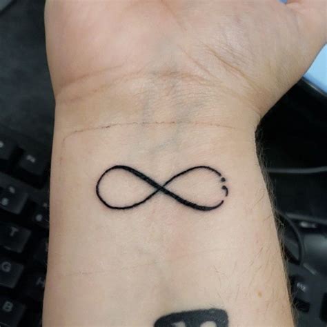 infinity semicolon tattoo.